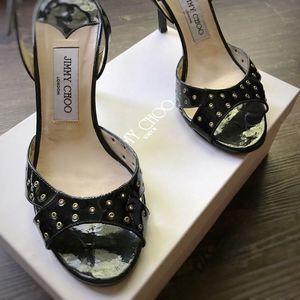 Jimmy Choo black patent grommet sling back pumps